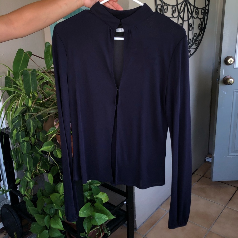 Open slit, reformation blouse.